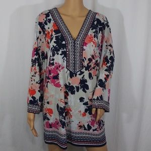Good condition.  Tunic with 3/4 sleeves.